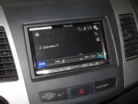 Фотография установки магнитолы Pioneer AVH-X8800BT в Mitsubishi Outlander XL