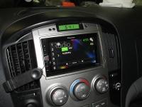 Фотография установки магнитолы Pioneer MVH-AV190 в Hyundai Grand Starex