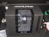 Установка сабвуфера Alpine SBE-1243BP в Ford Focus 2