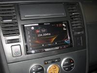 Фотография установки магнитолы Pioneer AVH-X5800BT в Nissan Tiida