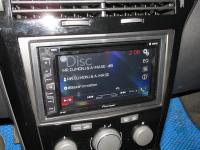 Фотография установки магнитолы Pioneer AVH-290BT в Opel Astra H GTC