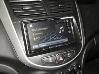 Фотография установки магнитолы Pioneer AVH-Z9100BT в Hyundai Solaris