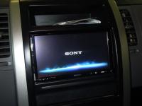 Фотография установки магнитолы Sony XAV-E70BT в Nissan X-Trail (T31)