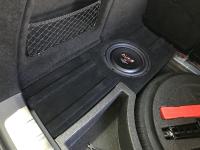 Установка сабвуфера Audio System R 10 FLAT EVO в Geely Tugella