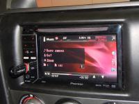 Фотография установки магнитолы Pioneer AVH-2300DVD в Mazda 3