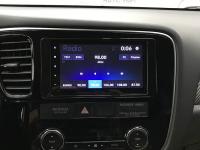 Фотография установки магнитолы Pioneer DMH-A4450BT в Mitsubishi Outlander III