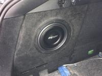 Установка сабвуфера Eton Move M10 Flat в Geely Tugella