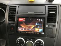 Фотография установки магнитолы Pioneer AVH-X5800BT в Nissan Tiida