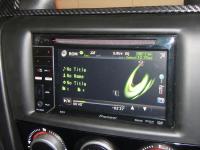 Фотография установки магнитолы Pioneer AVH-2300DVD в Mazda 3