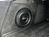 Установка сабвуфера Eton PW 10 Flat в Geely Tugella