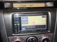 Фотография установки магнитолы Pioneer Navgate 32BT в Mazda 3