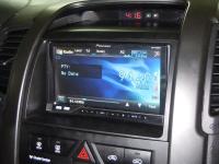 Фотография установки магнитолы Pioneer AVH-P4300DVD в KIA Sorento II (XM)