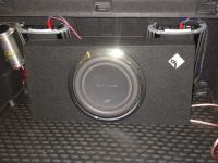 Установка сабвуфера Rockford Fosgate P3L-S12 в Opel Astra J