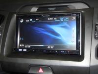 Фотография установки магнитолы Pioneer AVH-P4300DVD в KIA Sportage III (SL)