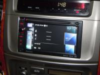 Фотография установки магнитолы Pioneer AVIC-F930BT в Toyota Land Cruiser 100