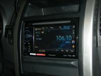 Фотография установки магнитолы Pioneer AVH-2400BT в Nissan X-Trail (T31)