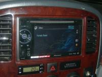 Фотография установки магнитолы Pioneer AVH-2400BT в Suzuki XL7