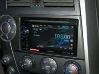 Фотография установки магнитолы Pioneer AVH-1400DVD в SsangYong Kyron