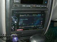 Фотография установки магнитолы Pioneer AVH-1400DVD в Subaru Forester (SF)