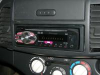 Фотография установки магнитолы Pioneer DEH-1400UB в Nissan Micra