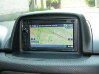 Фотография установки магнитолы Pioneer AVIC-F930BT в Subaru Forester (SG)