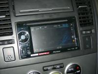 Фотография установки магнитолы Pioneer AVH-2400BT в Nissan Tiida