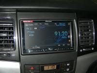 Фотография установки магнитолы Pioneer AVH-P3400DVD в SsangYong Actyon