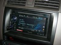 Фотография установки магнитолы Pioneer AVH-1400DVD в KIA Mohave