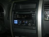 Фотография установки магнитолы Alpine CDE-W235BT в Nissan X-Trail (T31)