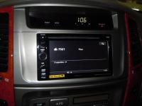 Фотография установки магнитолы Sony XAV-E60 в Toyota Land Cruiser 100