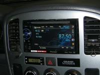 Фотография установки магнитолы Pioneer AVH-2400BT в Suzuki Grand Vitara