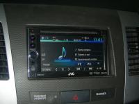 Фотография установки магнитолы JVC KW-AV60BTEE в Mitsubishi Outlander XL