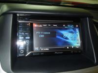 Фотография установки магнитолы Pioneer Navgate 32BT в Mitsubishi L200