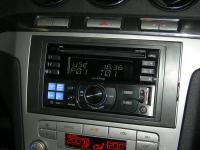 Фотография установки магнитолы Alpine CDE-W233R в Ford S-Max