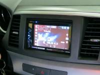 Фотография установки магнитолы Pioneer AVH-X1500DVD в Mitsubishi Lancer X