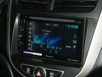 Фотография установки магнитолы Pioneer AVH-X1500DVD в Hyundai Solaris