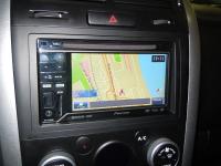 Фотография установки магнитолы Pioneer Navgate 32BT в Suzuki Grand Vitara