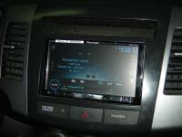 Фотография установки магнитолы Pioneer AVH-P8400BT в Mitsubishi Outlander XL