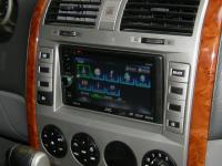 Фотография установки магнитолы JVC KW-AV61BTEE в KIA Carnival