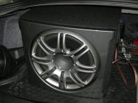 Установка сабвуфера Polk Audio db1212 в Mitsubishi Lancer X