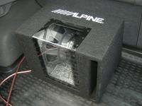 Установка сабвуфера Alpine SBG-1244BP в Mazda Atenza