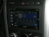 Фотография установки магнитолы Alpine INE-W920R в Suzuki Grand Vitara