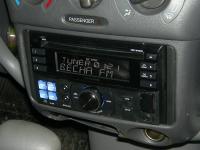 Фотография установки магнитолы Alpine CDE-W233R в Toyota Echo