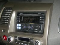 Фотография установки магнитолы Alpine CDE-W235BT в Honda Civic 4D