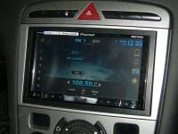 Фотография установки магнитолы Pioneer AVH-X8500BT в Peugeot 308