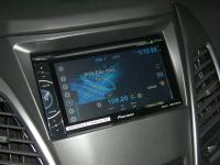 Фотография установки магнитолы Pioneer AVH-X1600DVD в SsangYong Actyon