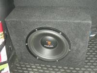 Установка сабвуфера Focal Polyglass Subwoofer 27 V2 в Hyundai Solaris