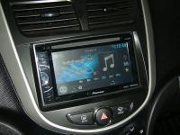 Фотография установки магнитолы Pioneer AVH-X1600DVD в Hyundai Solaris