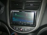 Фотография установки магнитолы Pioneer AVH-X4600DVD в Hyundai Solaris