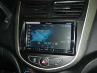 Фотография установки магнитолы Pioneer AVH-X4600DVD в Hyundai Solaris